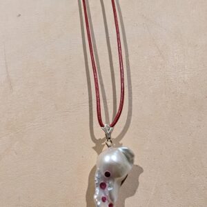 Baroque Pearl Pendant set with Graduated Rubies on Leather